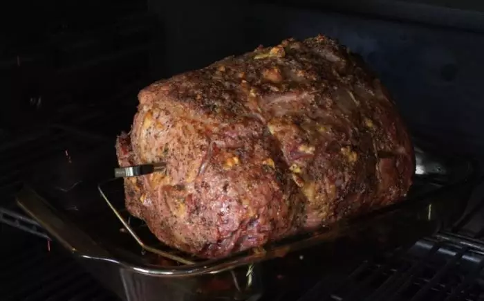 Using thermometer for roasted meats.